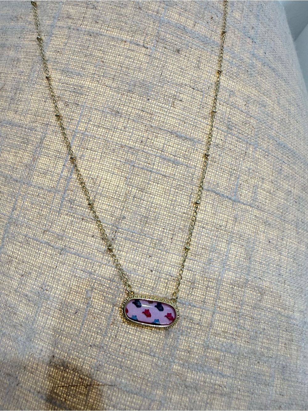 Gold oval pendant necklace, western cowboy